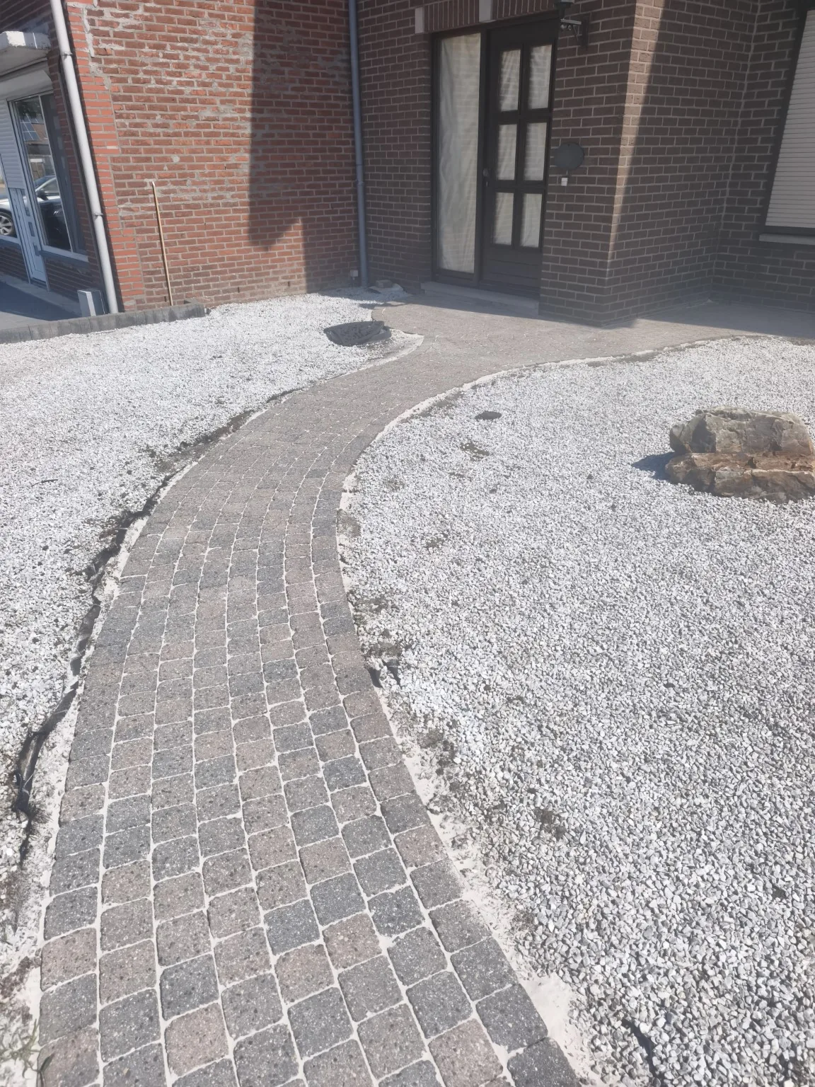 Gereinigd, opnieuw ingezand en gecoat klinkerpad